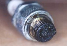 Fouled Spark Plug CARBON CLEANING SYSTEM